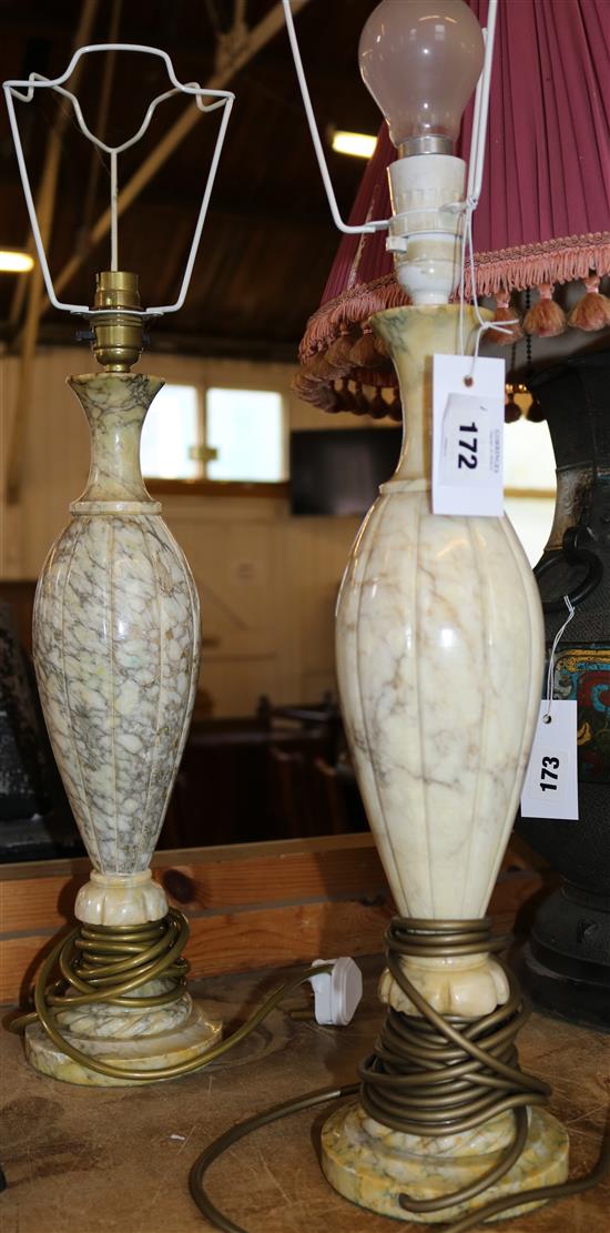 A pair of alabaster table lamps(-)